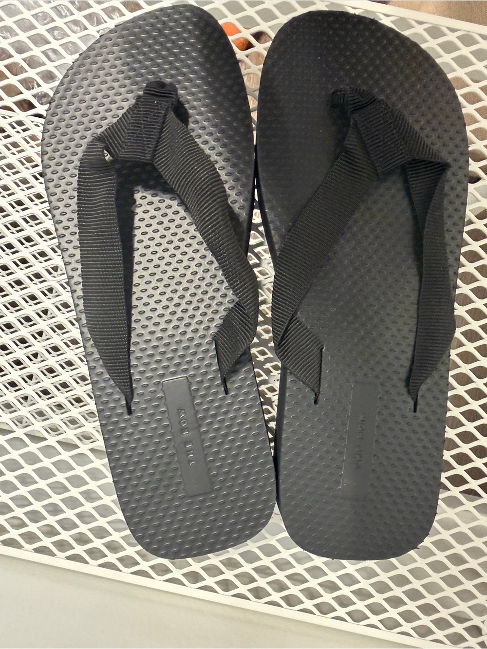 The Row Black Textured Rubber Flip Flops